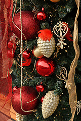 Image showing Christmas decoration with balls, cones and ribbons