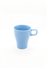 Image showing Bright blue ceramic cup isolated on white background