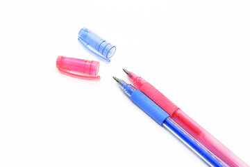 Image showing Colorful gel pens with a cap on a white background