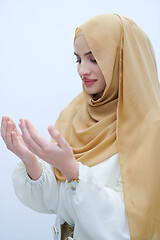 Image showing muslim woman making traditional prayer to God