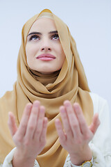 Image showing muslim woman making traditional prayer to God