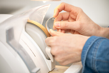 Image showing woman hone the edge of the eyeglasses