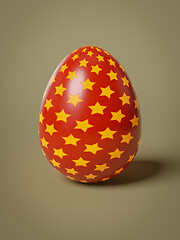 Image showing red egg with yellow stars isolated