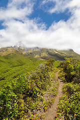 Image showing volcano Taranaki covered in clouds, New Zealand 