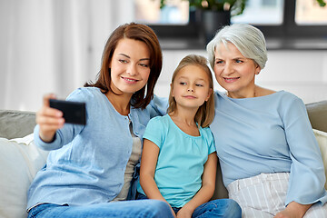 Image showing mother, daughter and grandmother taking selfie