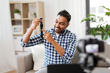 Image showing male blogger with smart watch recording video blog