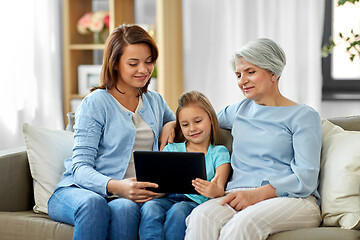 Image showing mother, daughter and grandmother with tablet pc