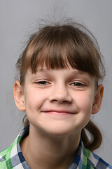 Image showing Portrait of a happy ten-year-old girl of European appearance, close-up