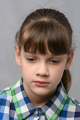 Image showing Portrait of a sad ten-year-old girl of European appearance, close-up