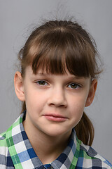 Image showing Portrait of a sad ten-year-old girl of European appearance, close-up
