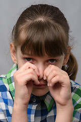 Image showing Portrait of a crying ten-year-old girl of European appearance, close-up