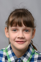 Image showing Portrait of a joyfully surprised ten-year-old girl of European appearance, close-up