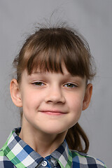 Image showing Portrait of a self-confident ten-year-old girl of European appearance, close-up