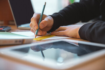 Image showing Caucasian entrepreneur, businessman, manager working concentrated in office