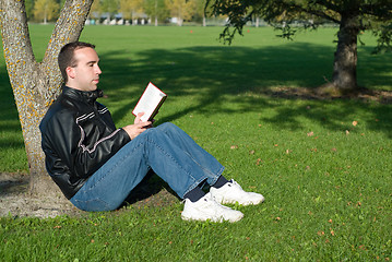 Image showing Man Reading Outside