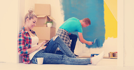 Image showing couple doing home renovations