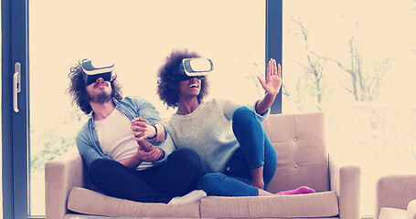 Image showing Multiethnic Couple using virtual reality headset