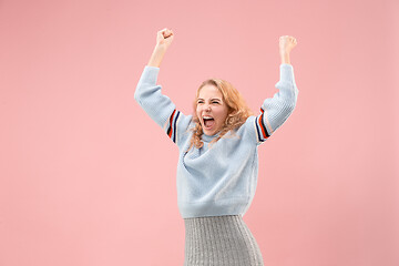 Image showing Winning success woman happy ecstatic celebrating being a winner. Dynamic energetic image of female model