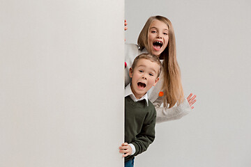 Image showing Banner with a surprised children peeking at the edge