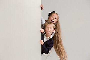 Image showing Banner with a surprised children peeking at the edge