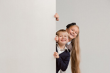 Image showing Banner with a surprised children peeking at the edge