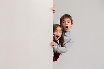 Image showing Banner with a surprised children peeking at the edge