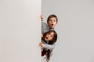 Image showing Banner with a surprised children peeking at the edge