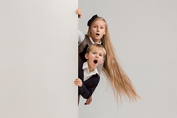 Image showing Banner with a surprised children peeking at the edge