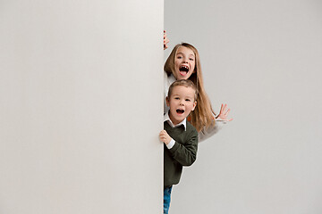 Image showing Banner with a surprised children peeking at the edge