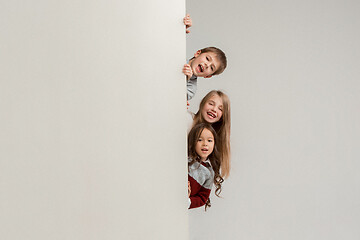 Image showing Banner with a surprised children peeking at the edge