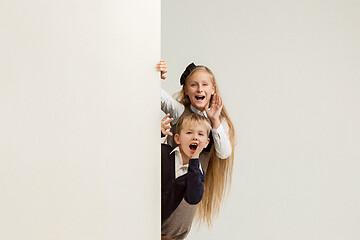 Image showing Banner with a surprised children peeking at the edge