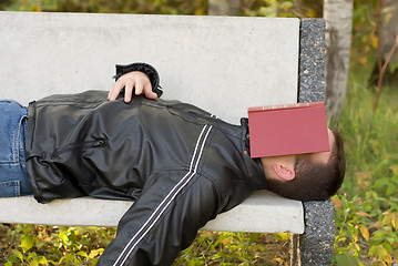 Image showing Man Asleep Outside