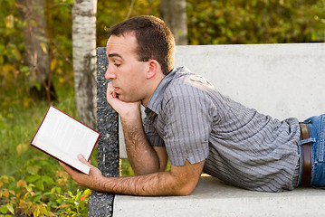 Image showing Man Reading A Novel