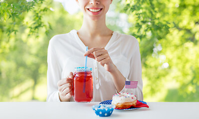 Image showing happy woman celebrating american independence day