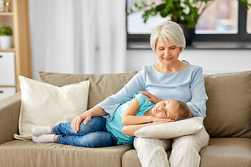 Image showing grandmother and granddaughter sleeping on pillow