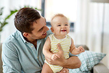 Image showing father with little baby daughter at home