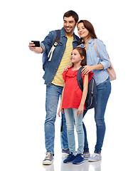 Image showing happy family with backpacks taking selfie