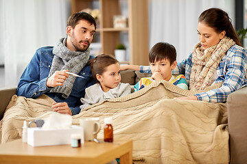 Image showing family with ill children having fever at home