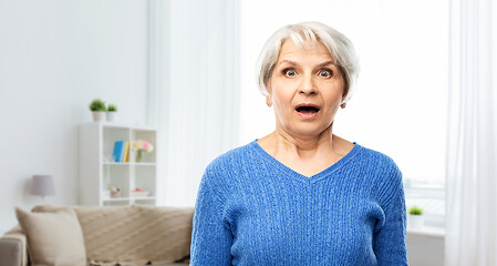 Image showing shocked senior woman with open mouth at home