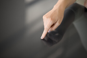 Image showing hand using black interactive panel