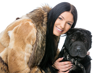 Image showing Girl with black shar pei dog