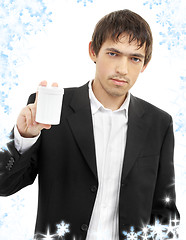 Image showing confident man showing blank medication container