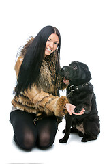 Image showing Girl with black shar pei dog