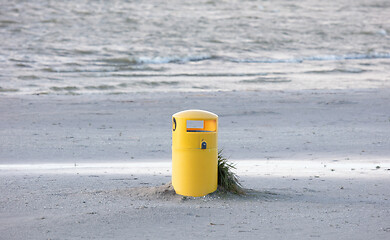 Image showing Waste bin on a sandy beach