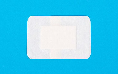 Image showing Band-aid against a blue background