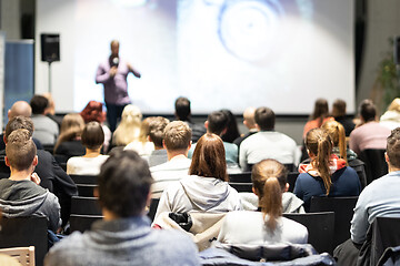 Image showing Business speaker giving a talk at business conference event.