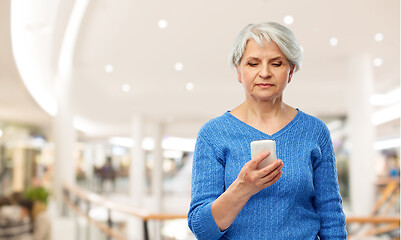 Image showing senior woman using smartphone