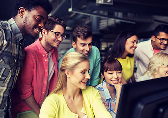 Image showing international students with computers at library