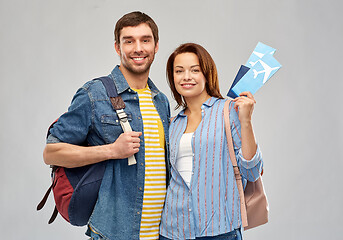 Image showing happy couple with air tickets, bags and passport