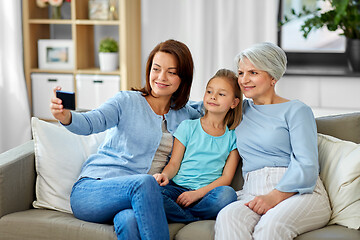 Image showing mother, daughter and grandmother taking selfie